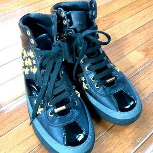 Very comfortable, fashionable mens Jimmy Choo high top casual sneakers!
